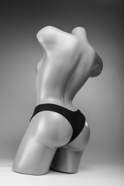 istock Women's black swimming trunks worn on a mannequin. 1128966068
