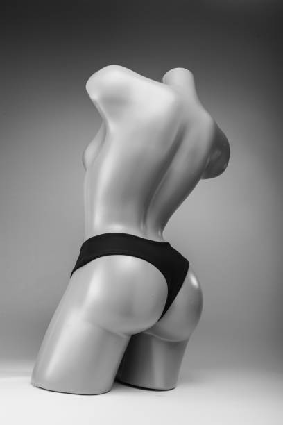 istock Women's black swimming trunks worn on a mannequin. 1128966120