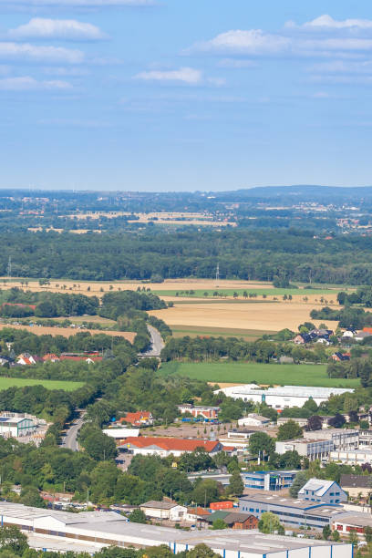 istock A city landscape in Germany. Buildings and arable fields. 1128967781