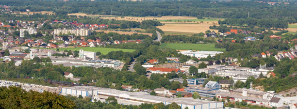 istock A city landscape in Germany. Buildings and arable fields. 1128967801
