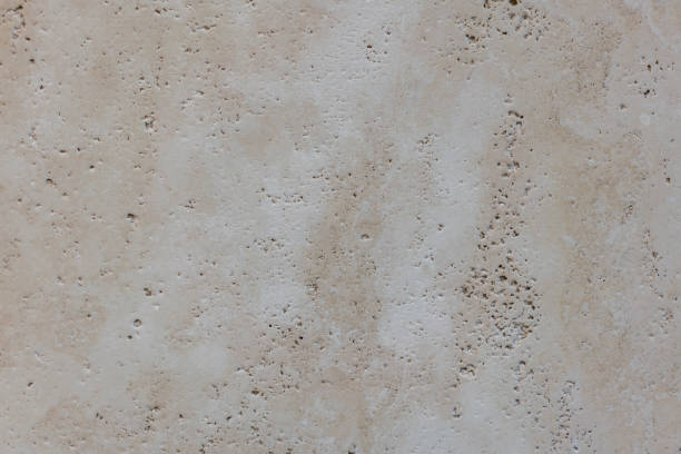 istock Warm concrete texture photo for background. Shabby chic backdrop. Natural stone surface with drips and dirt. Distressed texture in beige shades. Obsolete concrete floor top view photo. Grey stone. 1128969350