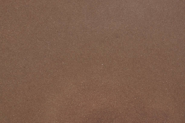 istock Brown natural stone with a homogeneous structure, called quartzite Cacao 1128971184