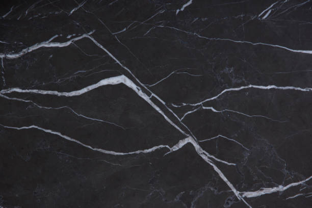 istock Natural marble is a black stone with white stripes called Nero Marquina 1128971218