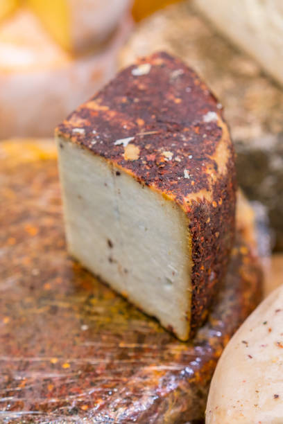 istock Craft cheese. Cheese head. Artisan cheese. vertical photo 1128971487