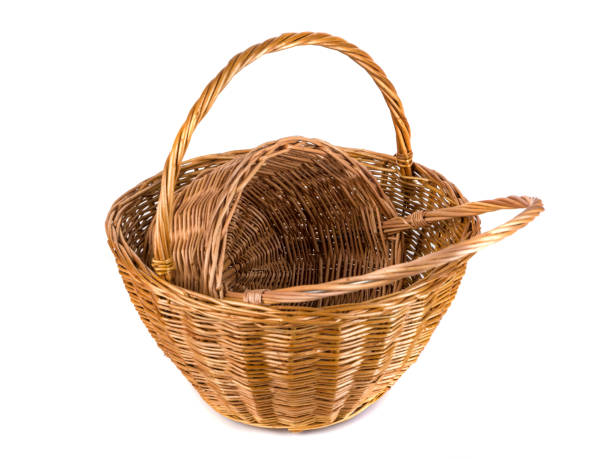istock Two empty wicker basket for fruits and vegetables, isolated on white 1128971565