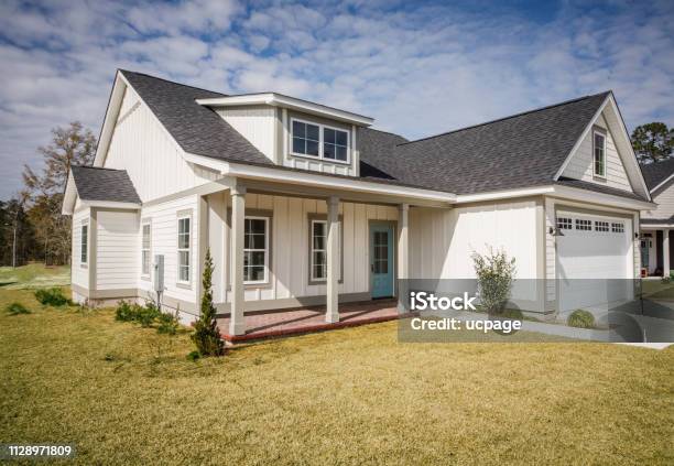 Empty White New Construction Cottage House Just Completed Stock Photo - Download Image Now