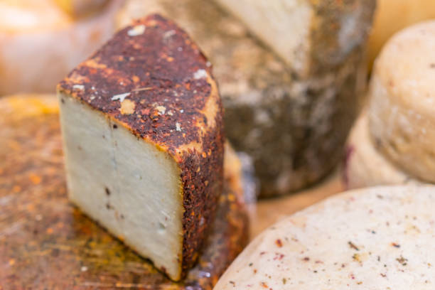 istock Craft cheese. Cheese head. Artisan cheese 1128971810