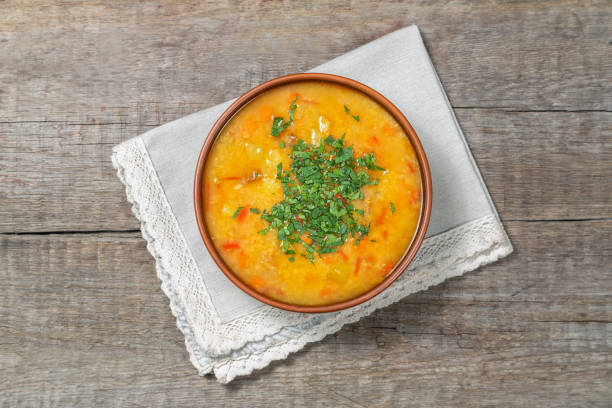 istock Red lentil soup with vegetables. The view from the top. Copy-space. 1128981320