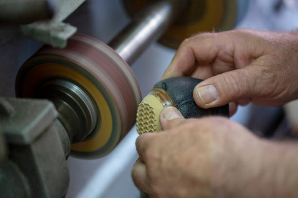 istock Shoemaker is repairing shoe 1128983480