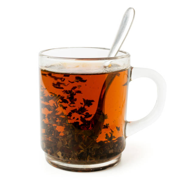 istock Black tea in glass Cup on a white, isolated. 1128983993