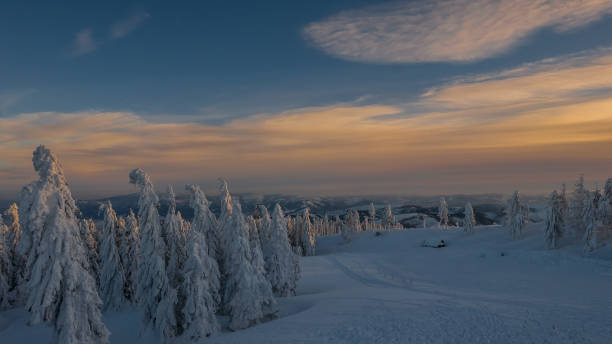 istock Sunset over the snowy mountains, Beskidy Mountains, Poland 1128985609