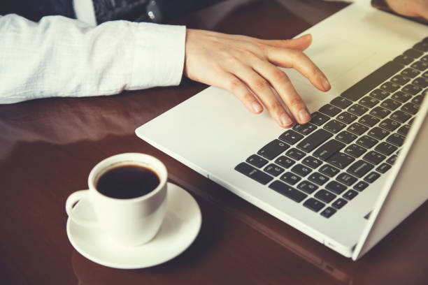 istock Woman hand on keyboard 1128987663