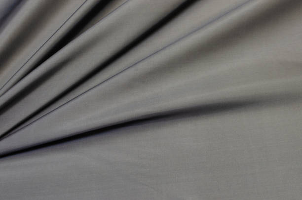 istock Lining fabric of viscose dark gray 1128988280
