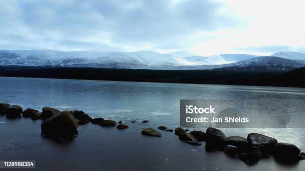 Snowy Loch Morlich Stock Photo - Download Image Now - Blue, Cairngorm Mountains, Cairngorms National Park