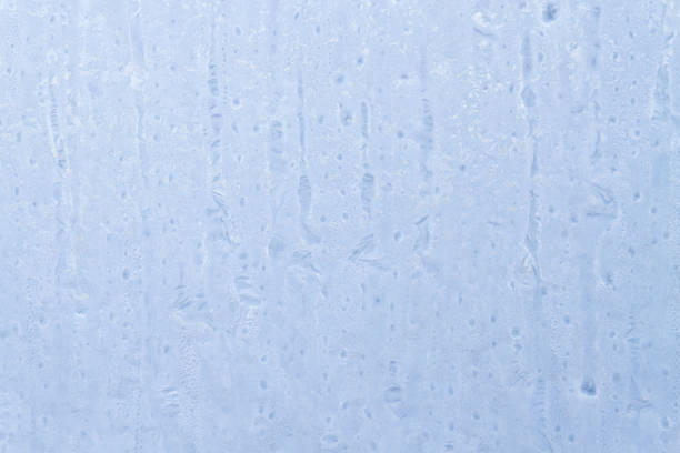 istock Frosty patterns on a frozen ice box in the early morning 1128989974