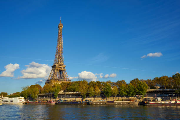 istock Eiffel Tower Taken From A Boat At Seine River 1128990191