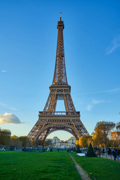 istock Eiffel Tower At dusk from the fields of Mars - Champs de Mars Square 1128990817
