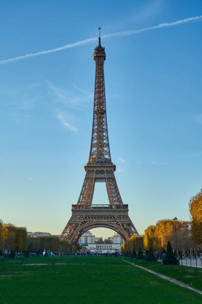 istock Eiffel Tower At dusk from the fields of Mars - Champs de Mars Square 1128990834