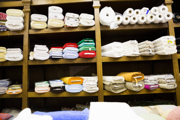 istock different fabric bolts exposed on shelves 1128991252