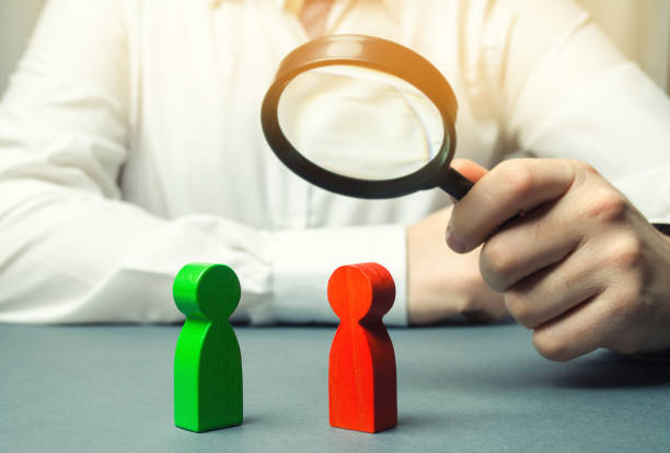 istock The arbitrator examines the conflict situation between people. Search for solutions and compromises. Conflict of interest. Smoothing disputes. Court and law. Justice. Verdict. Legal support 1128991407