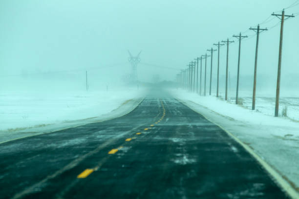 istock Snow covered roadway in winter 1128992323