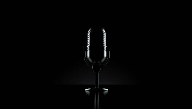 Radio microphone on black background Radio microphone on black background. 3d illustration podcasting photos stock pictures, royalty-free photos & images