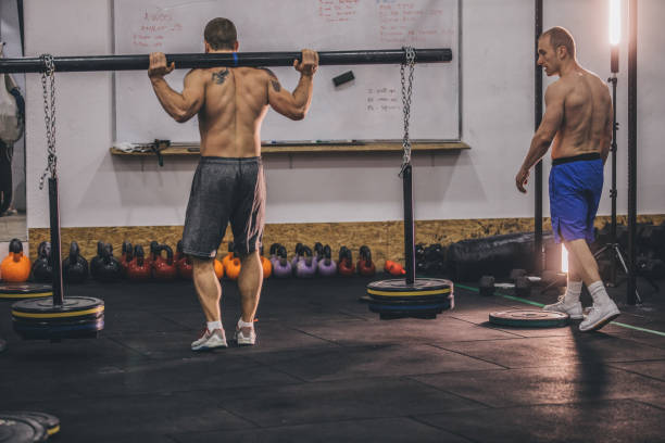 istock Hard workout at the gym 1128995348
