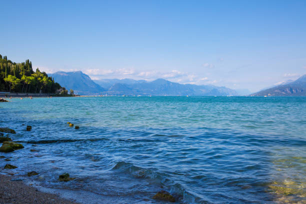 istock Garda lake and mountains, Italy. 1128999611