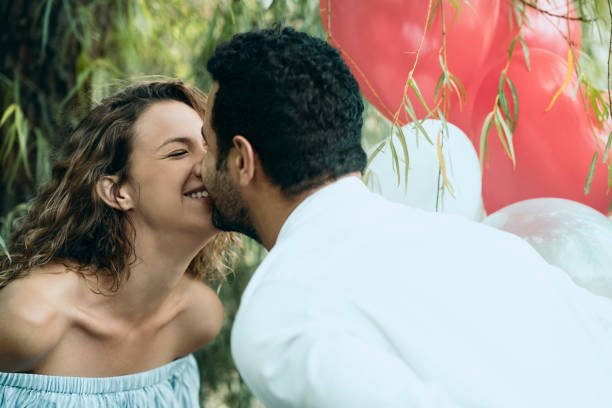istock couple kissing 1129003030