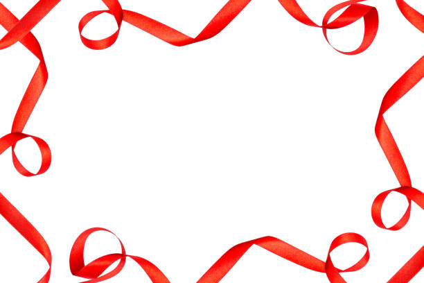 istock Frame made from red satin ribbons isolated on white background with clipping path and copy space in the middle. 1129012843