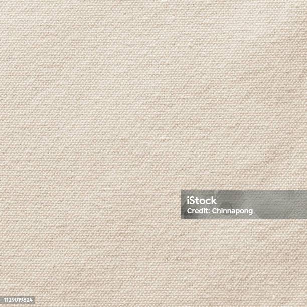 Beige Canvas Burlap Texture Background In Light Sepia Brown With Cotton Fabric Pattern For Arts Painting Backdrop Sacking And Bagging Design Stock Photo - Download Image Now