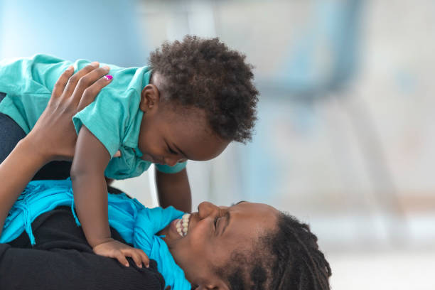 istock Laughing little boy with his mom 1129020135