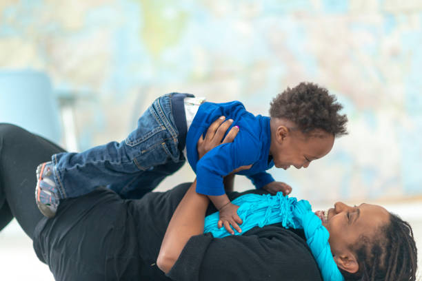 istock Laughing little boy with his mom 1129020137