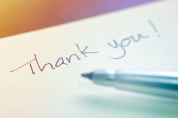 istock Thank You Written with a Pen on Sticky Note 1129023689