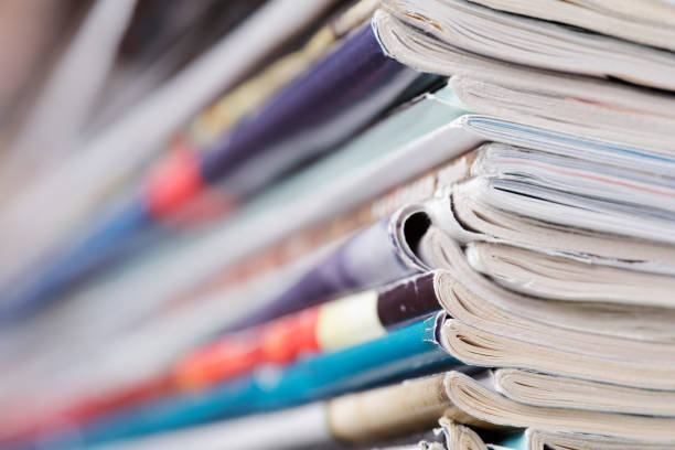istock Close-up photograph of a stack of old magazines 1129025992