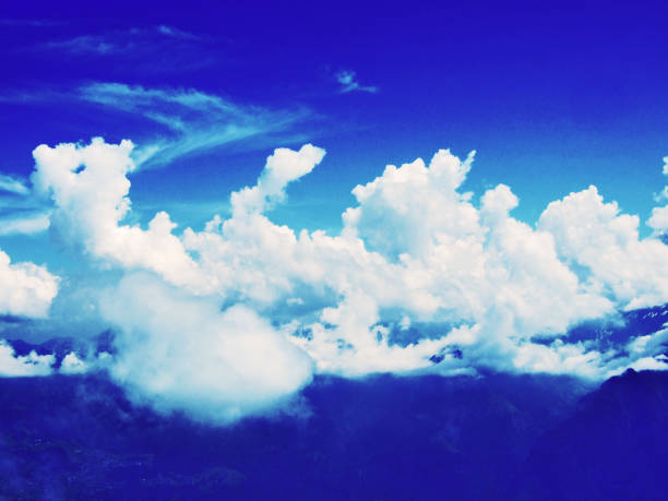 The beautiful clouds over the Alps and the river Rhine valley (Rheintal) - Canton of St. Gallen, Switzerland