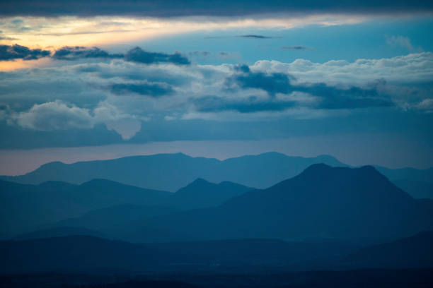 Border ranges Caldera at sunset from Lamington National Park. It has traditional significance to the local Bundjalung people. The local Aboriginal name for the mountain [of camera to the left} is \