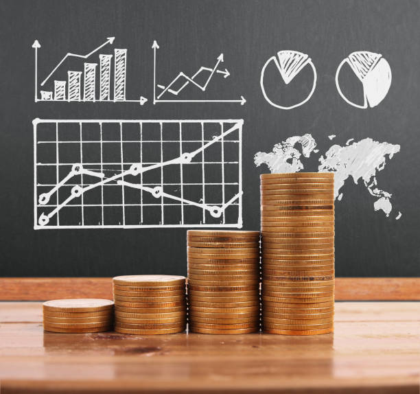 istock graph coins stock finance  business concept 1129033992