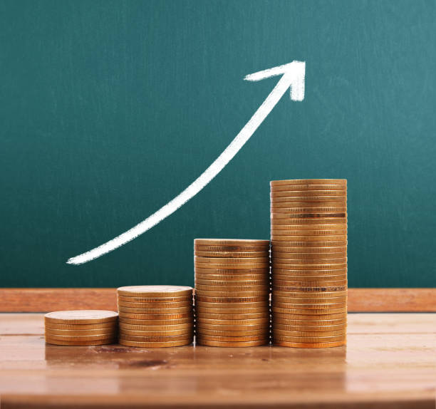 istock graph coins stock finance  business concept 1129033995