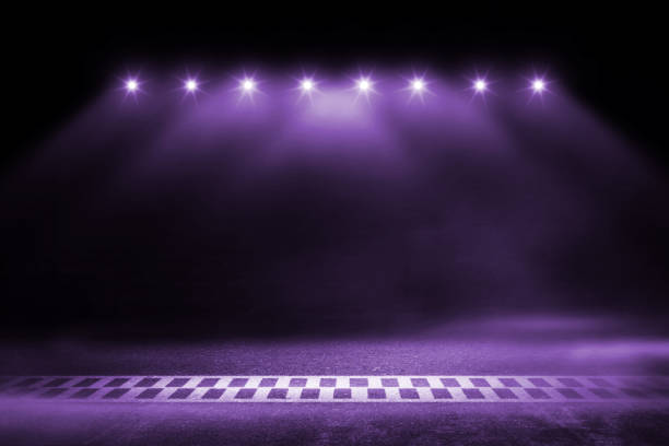 istock Race track finish line racing on night 1129034084