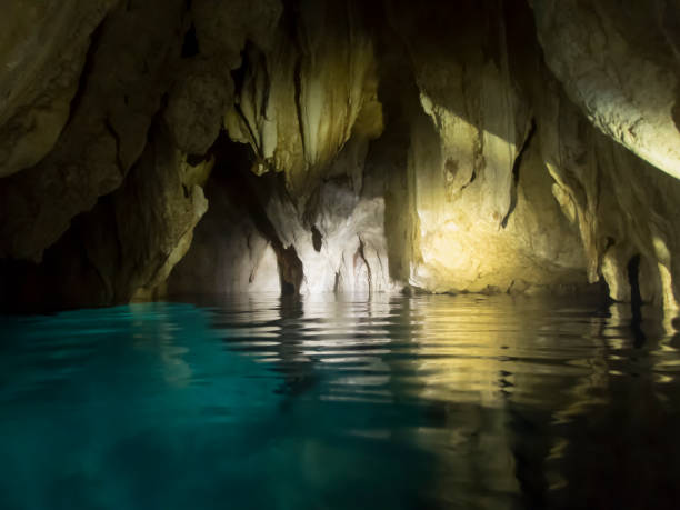 istock Underground Cavern with Water Reflection and Stalactites in Palau 1129037788