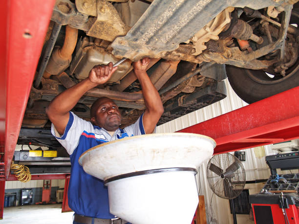 istock Mechanic Performing an Oil Change 1129037872