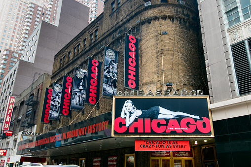 Exterior of the Ambassador theater with advertisement of the Chicago musical.