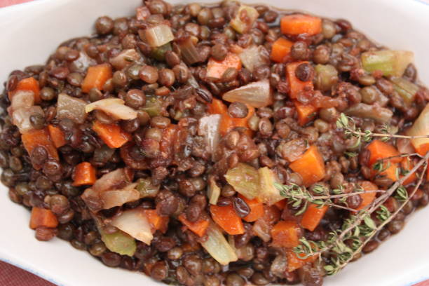 istock Green lentils cooked with vegetables  French cooking 1129045109