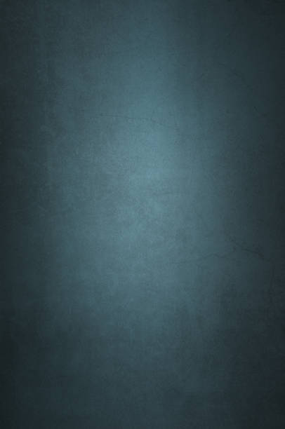 istock Background wall of aged textured old plaster blue. 1129045290