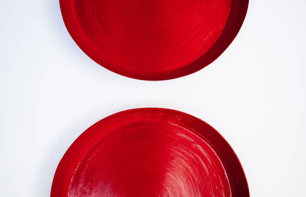 istock Red Thai  wooden lacquerware decorating tray on white wall 1129048247