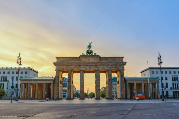 istock Berlin Germany, sunrise city skyline at Brandenburg Gate (Brandenburger Tor) 1129048909