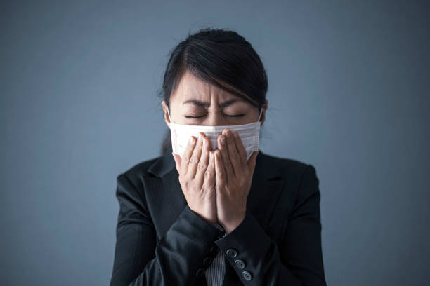 istock Business woman and cold 1129049893