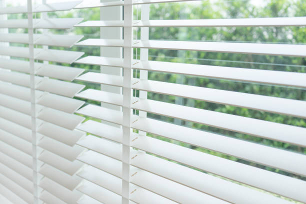 istock wooden window blinds, decorative interior home concept 1129052388