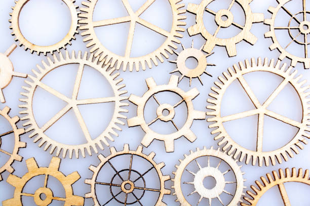 istock Gear wheels on white background as concept of engineering 1129053050